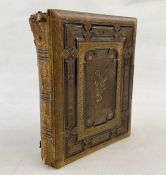 Victorian photograph album music box, pages floral decorated containing Victorian portraits (cover