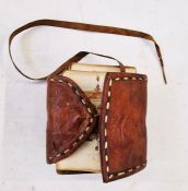 Antique Quran - Arabic script in black and red, unbound but with signs of binding in the form of red