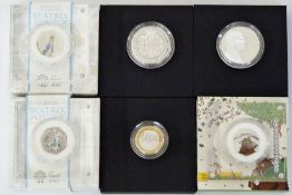 Silver proof collection consisting of six Royal Mint produced coins, two Peter Rabbit enamelled 50p,