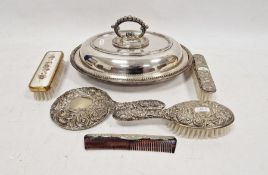 Silver-filled repousse mounted three-piece dressing table set of comb, brush and mirror, two other