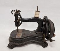 Heavy cast iron sewing machine by 'Wheeler(?) and Wilson, London