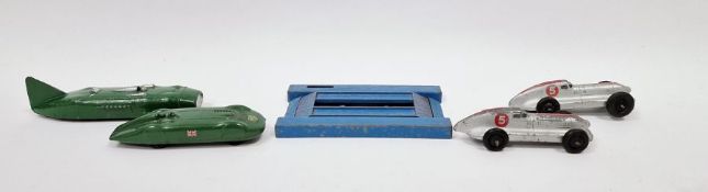 Four Dinky Toys playworn diecast model racing cars to include Gardner's M.G. Record Car 23p green