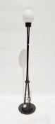 Black painted tapered standard lamp with white globe shade, 63cm high