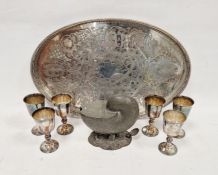 Silver-plated oval tray with pierced rim, a set of six silver-coloured metal Barker Ellis cups and a
