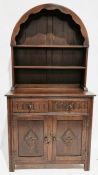 Oak Old Charm-style dresser, the arched raised back with two shelves, two drawers, cupboards below