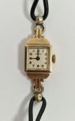 Gold-coloured metal Vertex lady's wristwatch on black leather strap