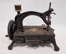 Mid- to late 19th century 'American Registered' sewing machine on heavy cut iron base