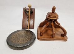 Contemporary stained oak wall bracket together with a wall mounting dinner gong, the bracket