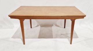 Johannes Andersen for Uldum Mobelfabrik, Denmark, teak draw leaf extending dining table on