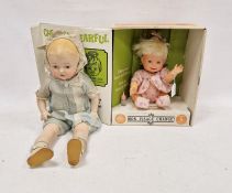 Baby doll with painted face, marked 'F.I.H C A.D.C' to back of head and a Cheerful Tearful crying