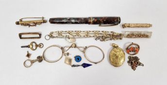 Gold-coloured oval engraved locket enclosing hair, a 14ct gold nib fountain pen, a lorgnette, a