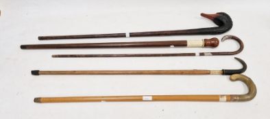 Assorted walking sticks, one with a carved mallard head, another with a sheep horn (5)