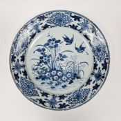 18th century blue and white delft charger with birds and foliage decoration, 34cm diameter