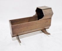 Antique oak cradle, 61cm high x 87cm approx.