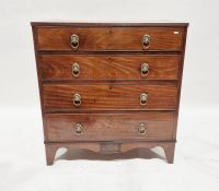 19th century mahogany chest of four long graduated drawers, lion mask handles, on bracket feet, 99cm