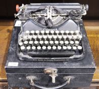 Vintage Corona typewriter with case