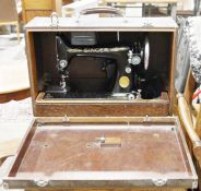 Vintage Singer sewing machine in wooden case, no.EA833584