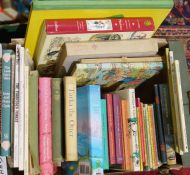 Quantity of children's books, cartoon collections, annuals, Asterix books and Ladybird Nature books,