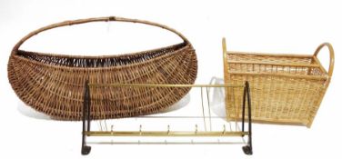 Two vintage atomic-style magazine racks, a vintage wooden Haxyes magazine rack, a wicker basket, a