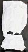 An Edwardian child's lawn cotton nightdress/petticoat, pintuck and frill detail, long sleeves with
