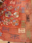 Heavy cotton kilim-style hanging, the red ground with octagonal quartered elephant foot guls, in