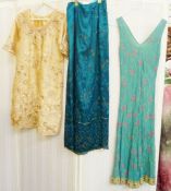 A vintage cocktail dress Chinese style apricot coloured satin embroidered heavily with faux