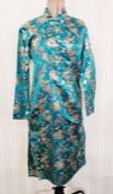 A vintage c.1950s cheongsam, machine embroidery on a turquoise ground, modern size 10