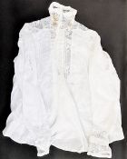 An Edwardian white cotton blouse, detailed with with lace on fine net, embroidered, pin-tucked and
