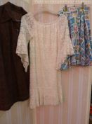 Assorted vintage costume to include 1950's skirts, a white lace minidress with angel sleeves, a