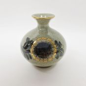 Royal Copenhagen vase, of squat baluster form, with gilt sunflower decoration over a sage green