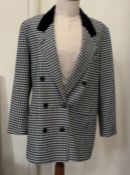 A Bromanta tweed jacket, lady's, waisted, with three wooden button fastenings, a black and white