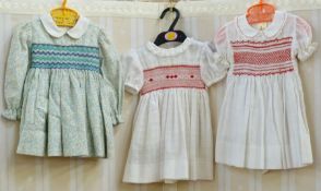 Hand smocked children's dresses by Jill Barry - (Daisy Chain)18 months to 2 years (3), two little