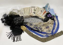 An early 20th century shawl, clear bugle beads embroidered on black silk thread, a waxed flower