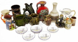 Assorted continental vases, jugs, etc, a guggle fish vase, a railway regulator lever Swiss clock