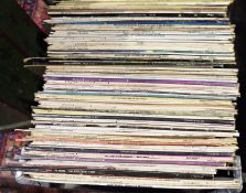 Large collection of vinyl LPs in four boxes, mainly classical, compilations, easy listening and film