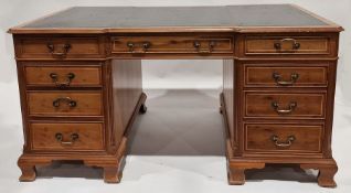 Modern walnut veneer partners' desk with green leather inset top, having one long drawer flanked