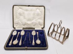 1960's silver toast rack, Sheffield, makers mark T&S and a cased set of 1920's silver teaspoons