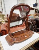 Victorian mahogany dressing table mirror with round arch plate and on scroll uprights, shaped