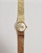 Ladies Eterna-Matic 9ct gold manual wind wristwatch, the circular dial with raised gilt baton