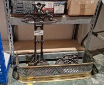 Late 19th/early 20th century cast iron umbrella stand with moulded decoration to the top, 66cm