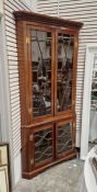 19th century mahogany floor standing corner display cabinet with dentil cornice, the top with two