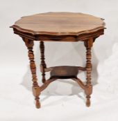 19th century mahogany occasional table, with shaped top, on turned supports and undertier, 68cm high