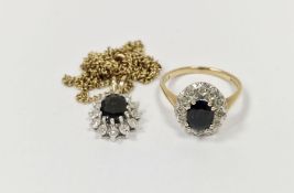 9ct gold, sapphire and diamond cluster ring in oval setting, the oval sapphire 7mm x 5mm