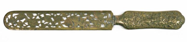 Early 20th century Anglo-Indian metal page turner/letter opener, the handle embossed with birds