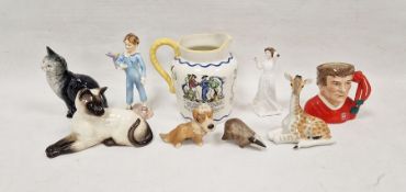 Royal Worcester figure of a boy, titled 'Parakeet' modelled by F G Doughty, modelled standing