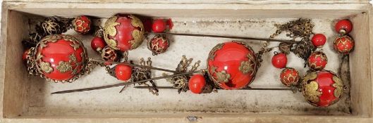 Set of four red glass and gilt overlay hat pins