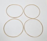Three 18ct gold bangles, 14.5g and another unmarked, 6g (4)