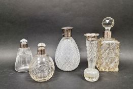 Silver-mounted cut glass scent bottle, ovoid, Chester assay, a smaller spherical scent bottle,  a