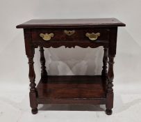 Antique oak side table with single drawer, brass handles, on turned supports and under-shelf. H.