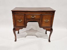 Oak lady's kneehole desk with three drawers around the kneehole, on cabriole supports, 79cm high x